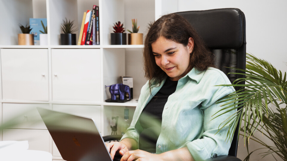 Rada working on her Laptop